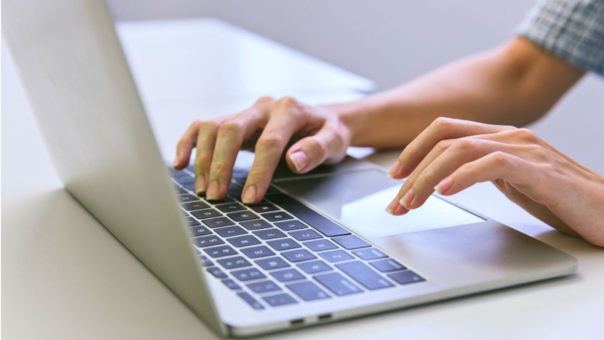 Someone actively researching keywords on a laptop to improve Palmetto SEO results.